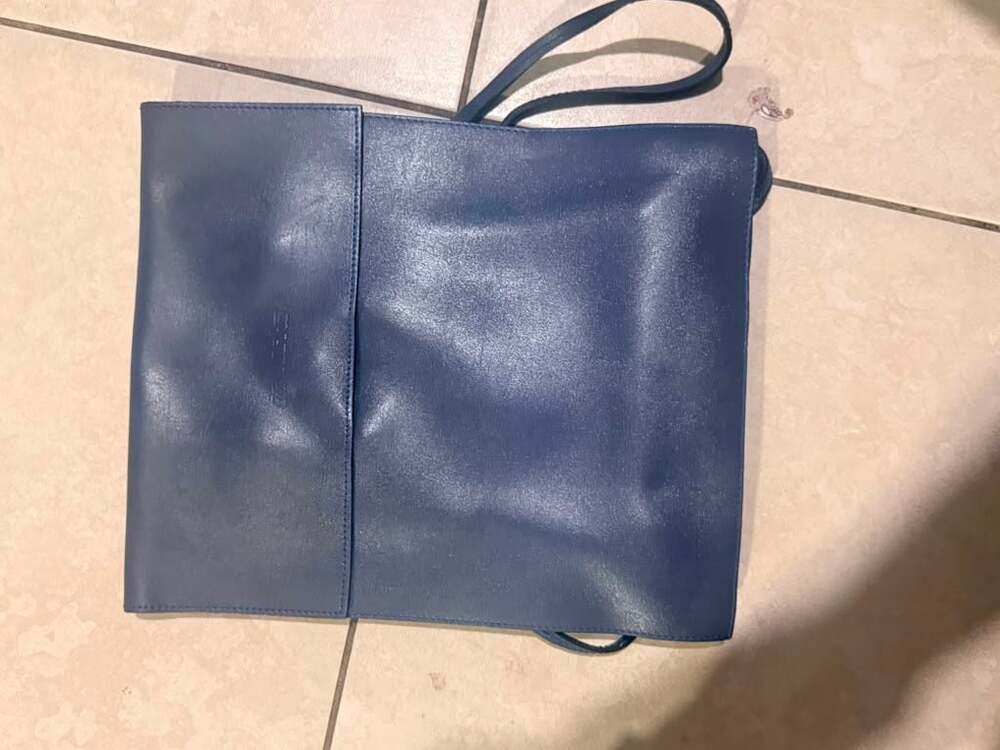 Invicta Genuine Leather Blue Drawstring Shoulder Bag